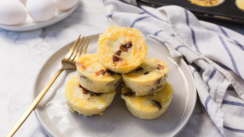 Copycat Starbucks Bacon And Gruyère Egg Bites stacked on a plate
