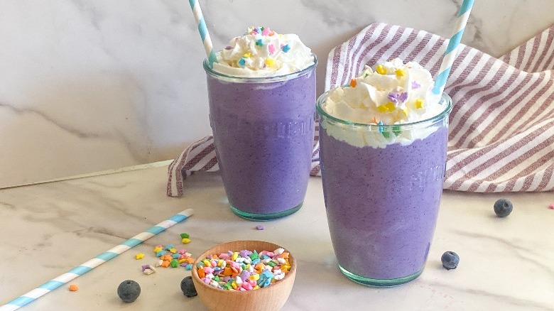grimace shake in 2 glasses