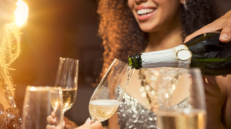 sparkling wine being poured
