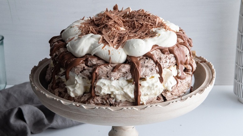 chocolate pavlova on stand