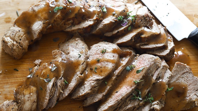 pork tenderloin on a cutting board 