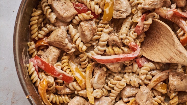 pasta and chicken in skillet