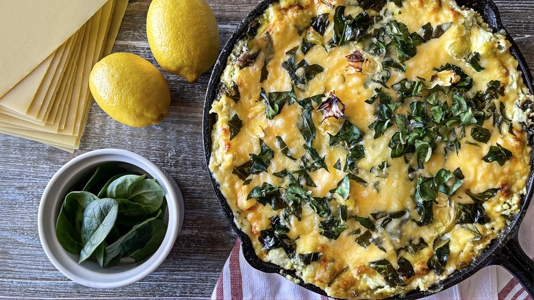 spinach lasagna in iron pan