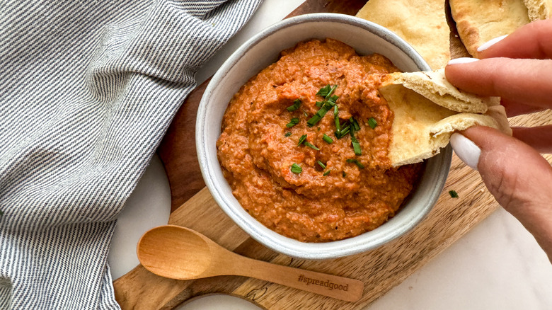 dipping pita in dip