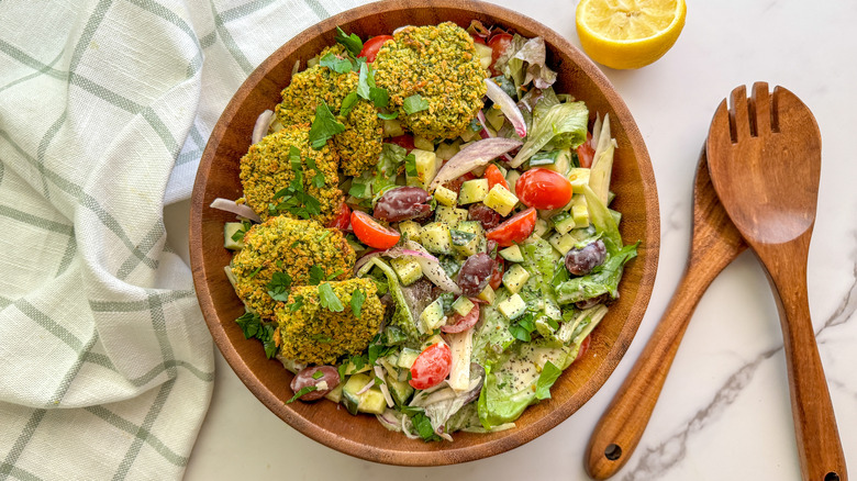 falafel salad in wood bowl