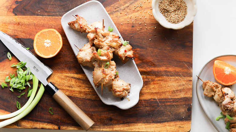 Plate with air-fried chicken skewers