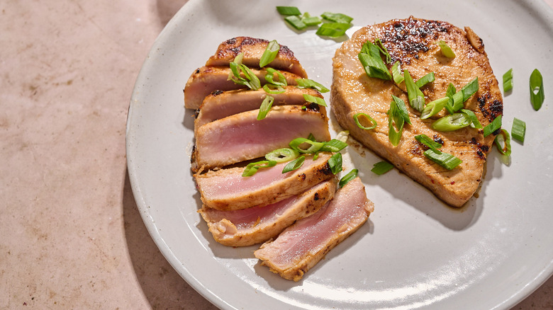 sliced tuna steak on plate