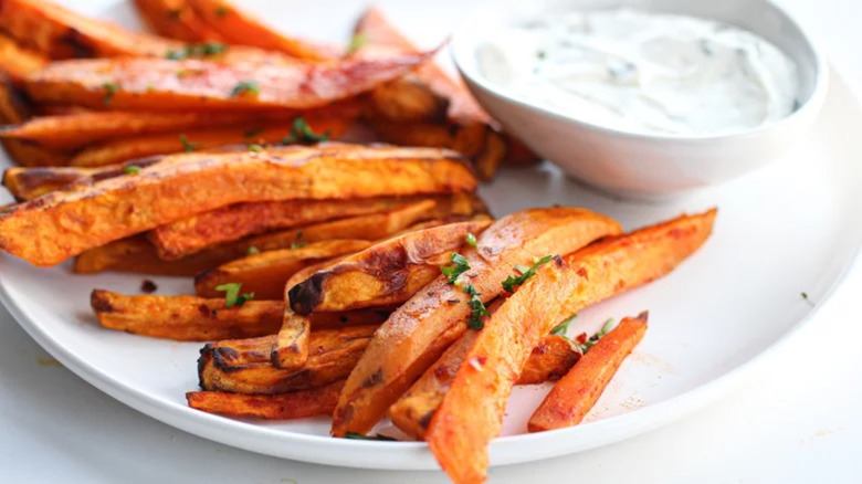 A plate of sweet potato fries and dip