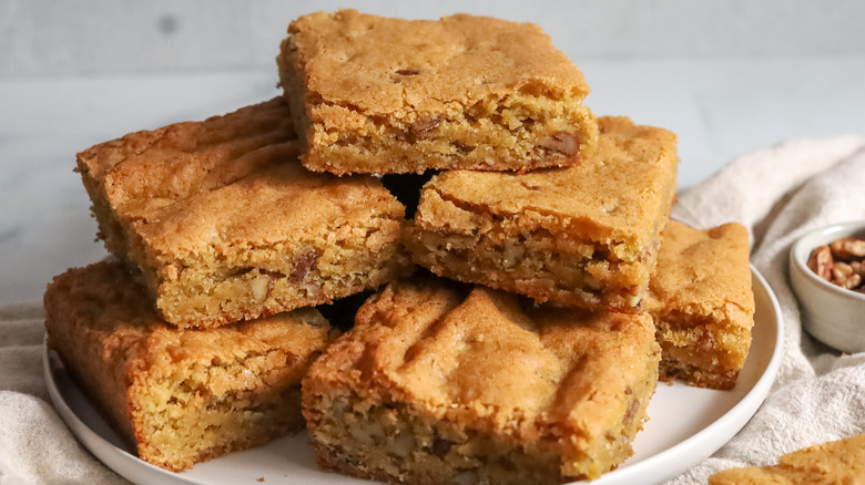 light brown bread, cake, or bar cookies on a white plate