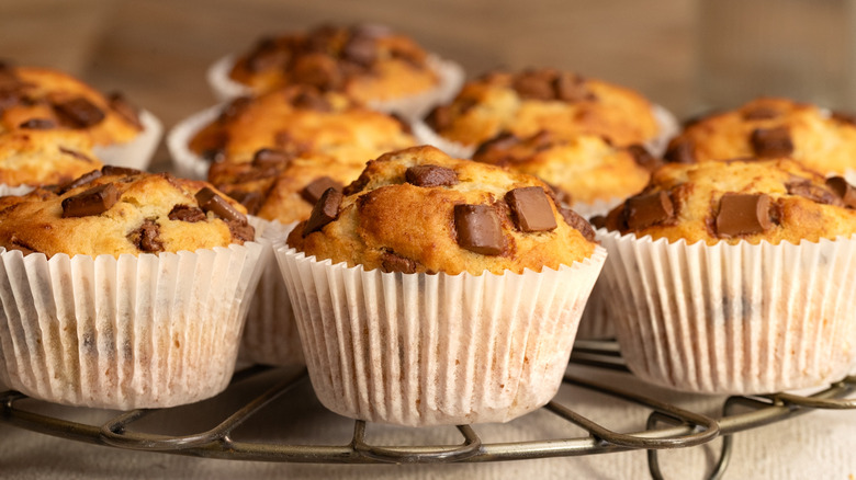 Banana chocolate chip muffins on wire rack