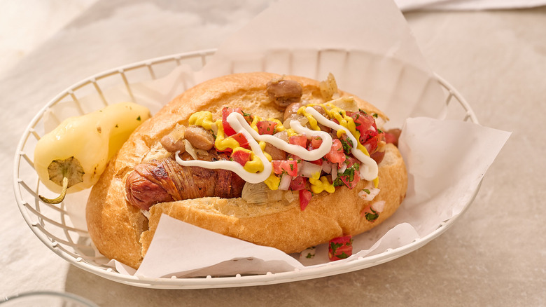 sonoran hot dog in a basket