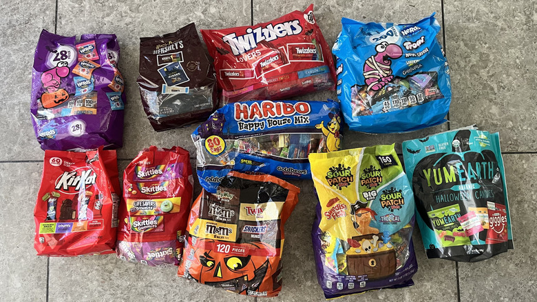 Bunch of candy packs with tile background
