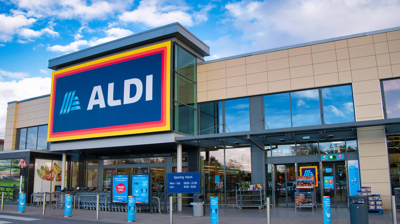 Exterior of an Aldi store and parking lot