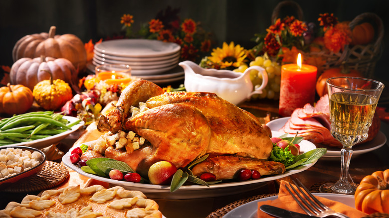 A Thanksgiving spread with a turkey centerpiece