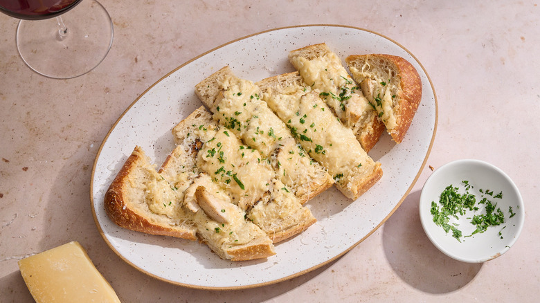chicken Alfredo garlic bread on a platter