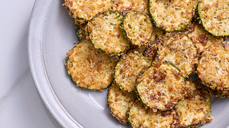 zucchini chips in a bowl on a table