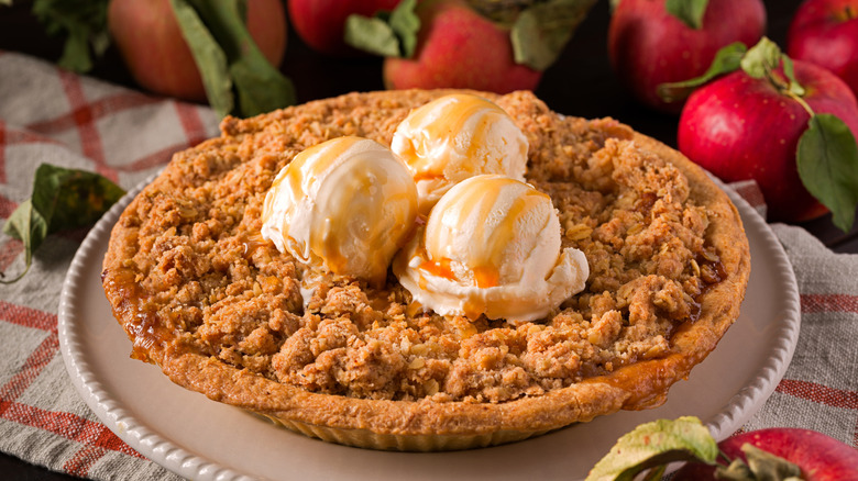 apple crumb pie topped with ice cream