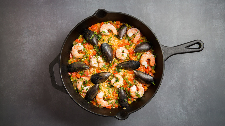 seafood and rice in skillet