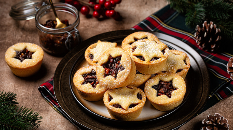 Mince pies on table with vintage and plaid Christmas decor