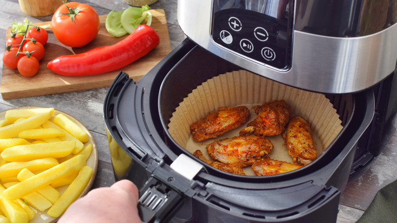 Chicken wings in air fryer basket