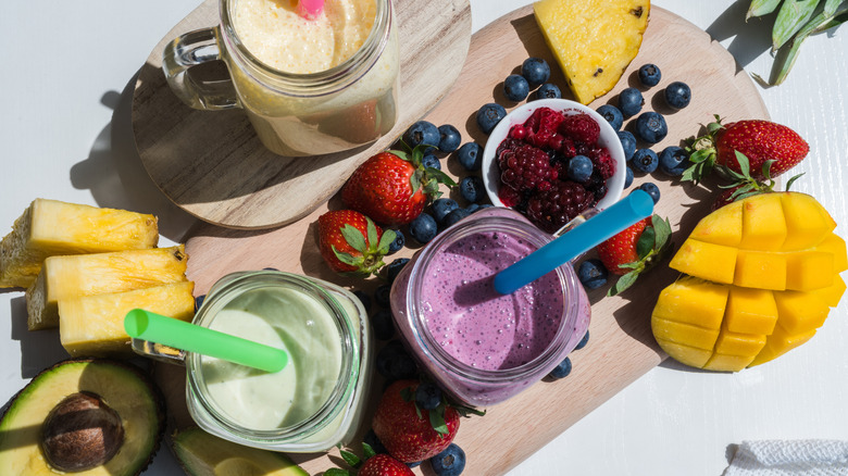 variety of smoothies and fresh fruit