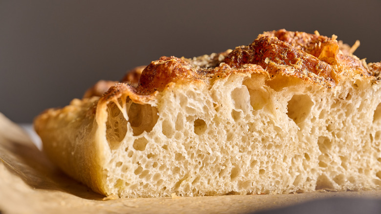 View of inside of focaccia on a table