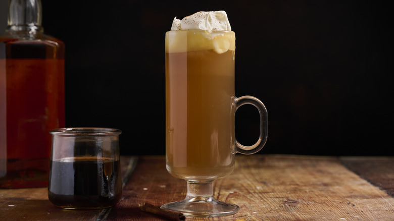 hot buttered whiskey in a glass on a table