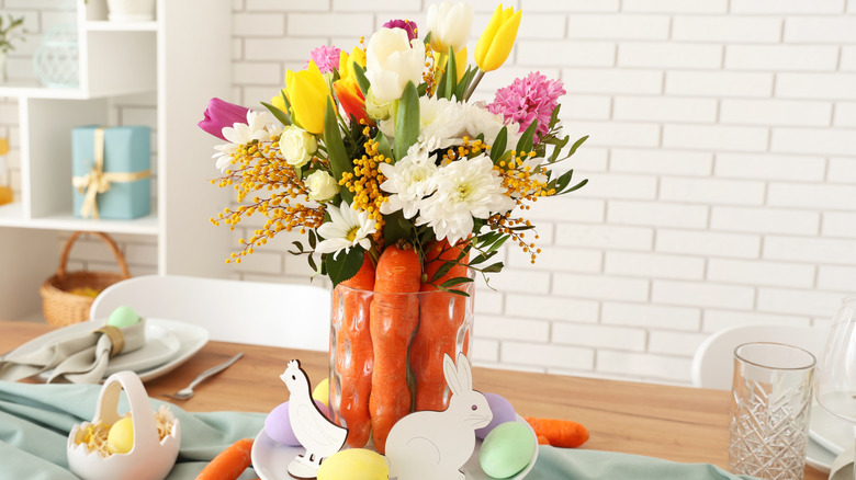 A carrot flower arrangement on an Easter table
