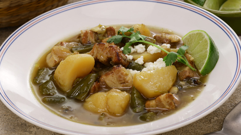 A close-up of a bowl of chunky chile verde