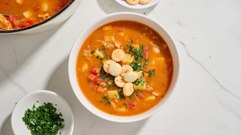 Bowl of clam chowder on a table