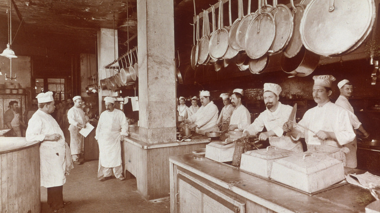 An old photograph of chefs preparing at Delmonico's Steakhouse