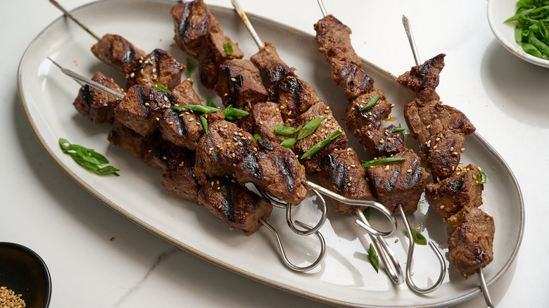 beef bulgogi skewers on a plate