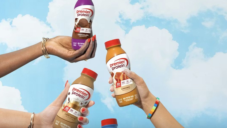 people holding different kinds of Premier Protein shakes