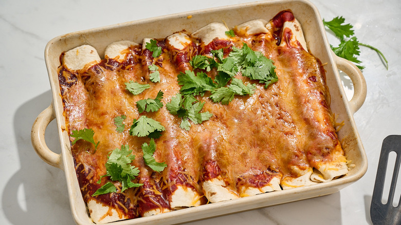 Veggie enchiladas in a casserole dish