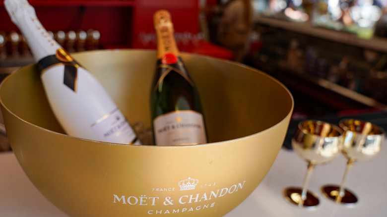 Champagne bottles in ice bucket