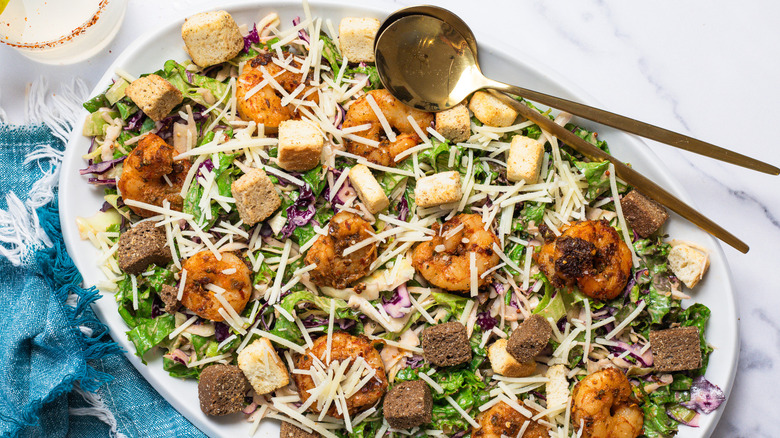 Platter of Baja shrimp Caesar salad alongside margarita.
