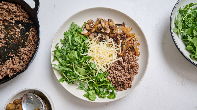 mushroom and swiss cheeseburger bowl on a table