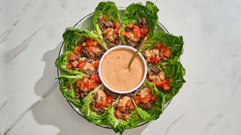 Burger lettuce wraps assembled in a large bowl