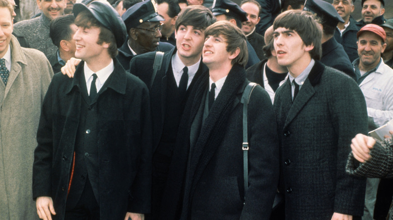 The Beatles at an airport