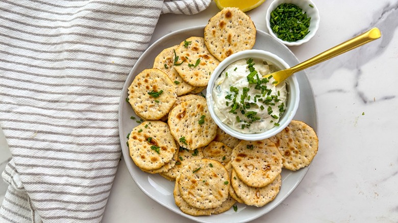 cheese dip surrounded by crackers