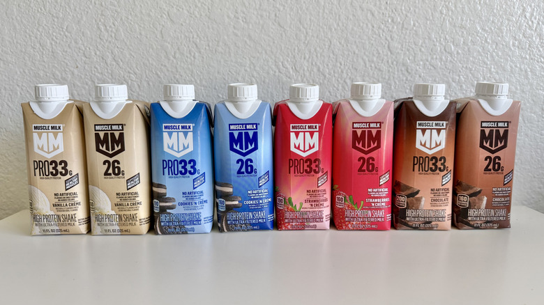 Various Muscle Milk flavors on a table