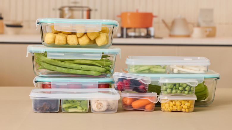 Meal prepped vegetables in glass food storage containers.