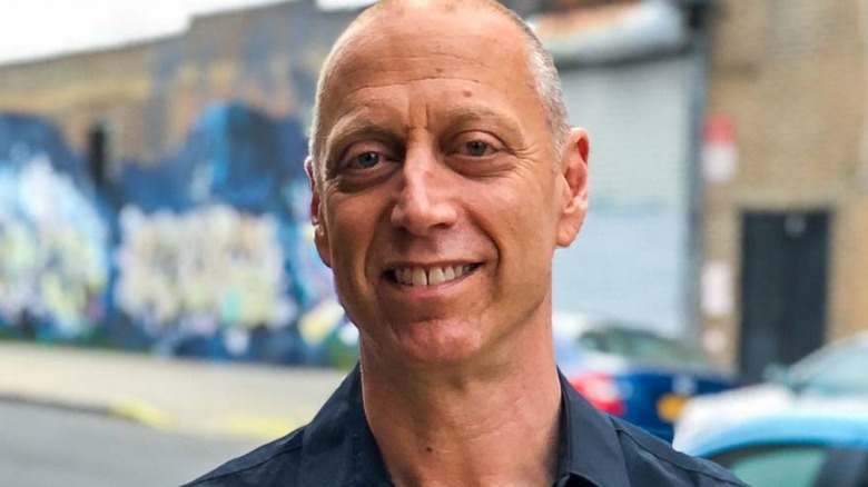 David Lebovitz standing on the street in Paris