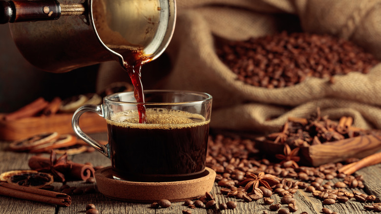 Coffee beans and fresh brewed coffee