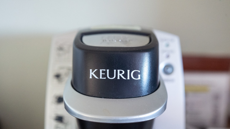Close-up of logo on Keurig coffee maker