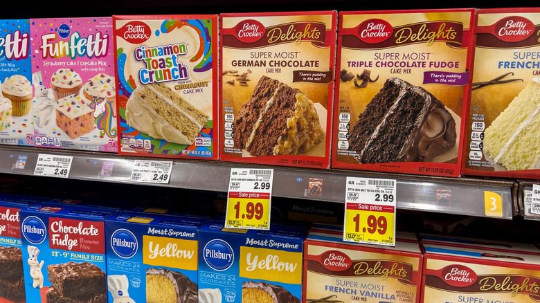 Boxed Cake Mixes on a retailer shelf.