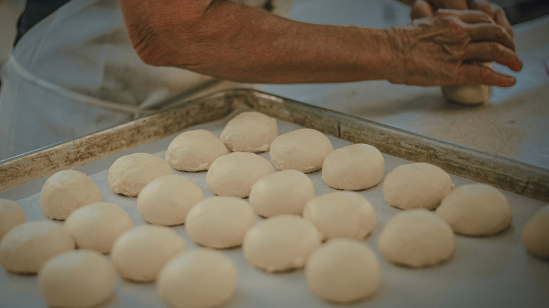 elderly woman making Amish baked goods