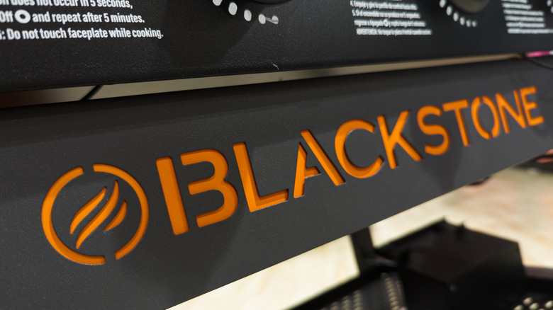 Closeup of the Blackstone grill logo on the front