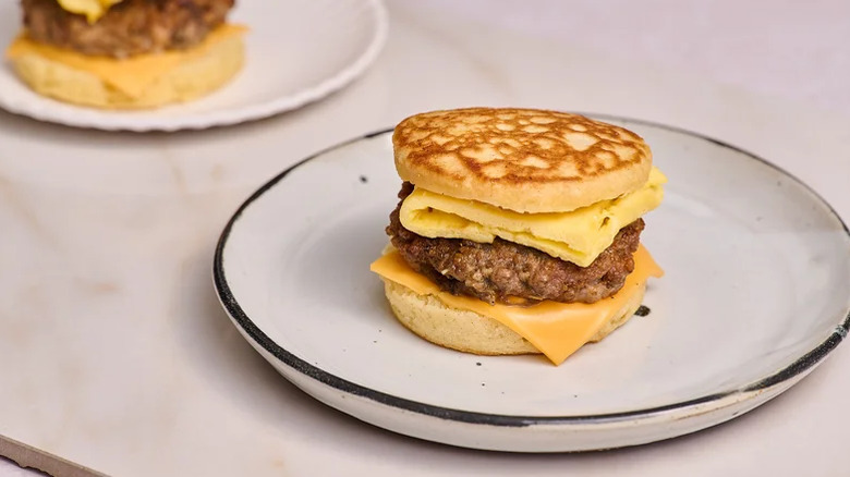 McDonald's Copycat Homemade Sausage McGriddle on a plate with one more piece in the back