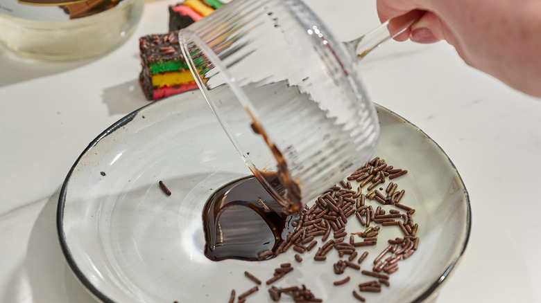 rolling martini glass in chocolate